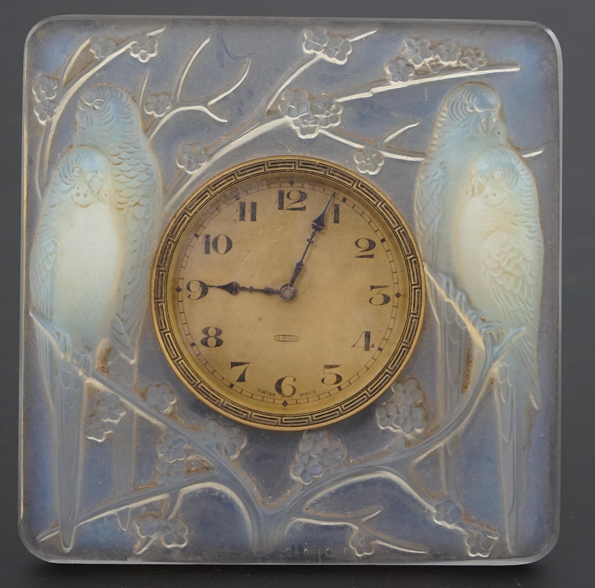 A R. Lalique Quatre Perruches opalescent glass strut timepiece